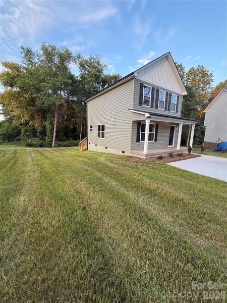 Exterior details and patio area of a home in , Statesville (Image 3).