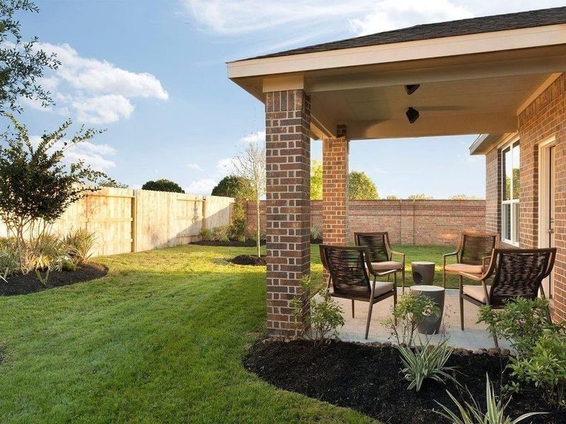Exterior details and patio area of a home in Riviera Pines - Premier Series, Huffman (Image 2). Exterior details and patio area of a home in Riviera Pines - Premier Series, Huffman (Image 2).