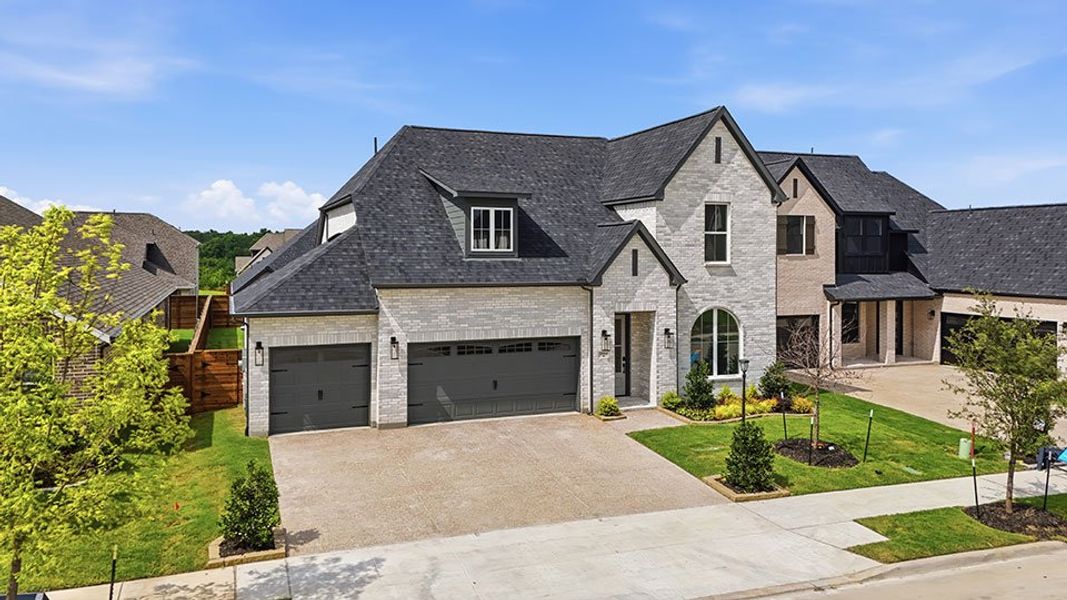 Front exterior of a new home in Solterra Texas, Mesquite, TX, highlighting curb appeal (Image 23). Front exterior of a new home in Solterra Texas, Mesquite, TX, highlighting curb appeal (Image 23).