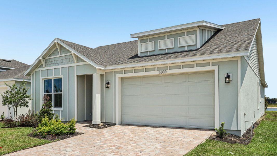 Representative exterior photo of a completed home built from the Longleaf by DRB Homes in Ardisia Park, New Smyrna Beach, FL (Image 25).
