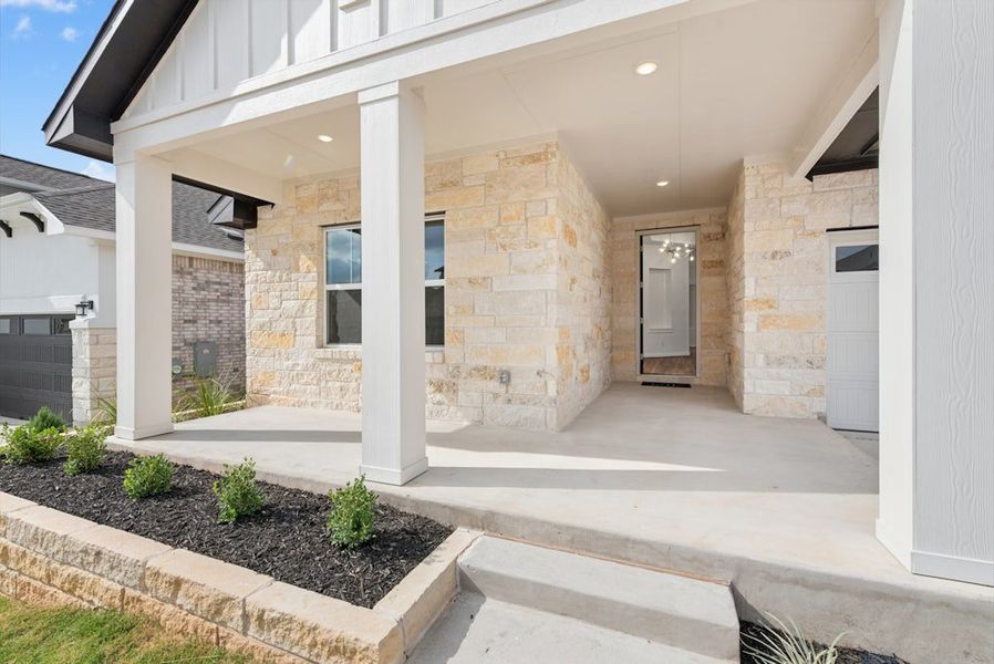 Exterior details and patio area of a home in University Heights, Round Rock (Image 28).