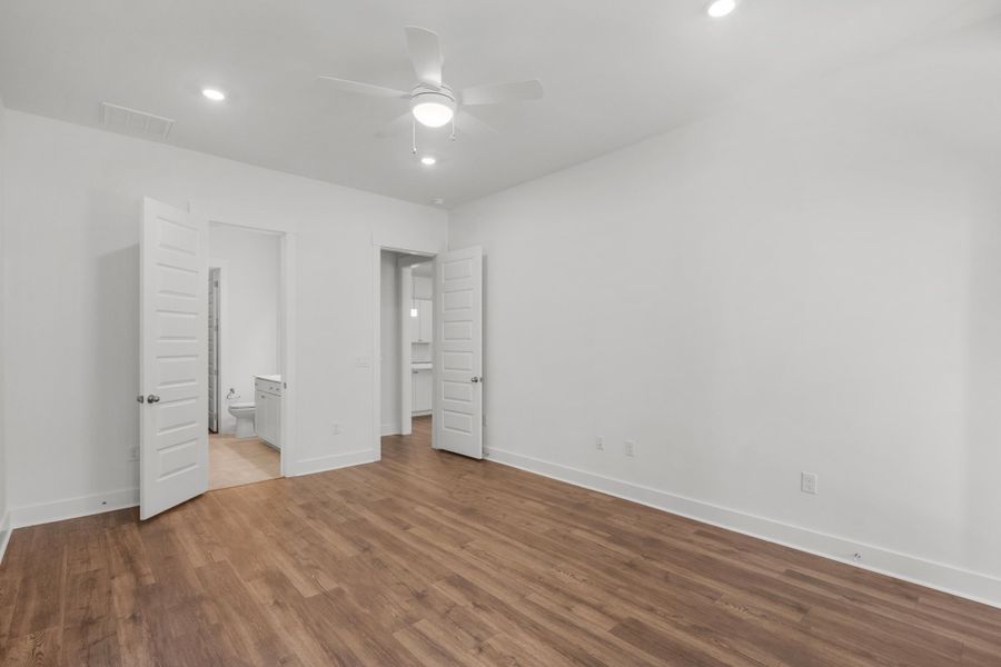Spacious, unfurnished interior of a new home in Long Bay Golf Club, Longs (Image 29).