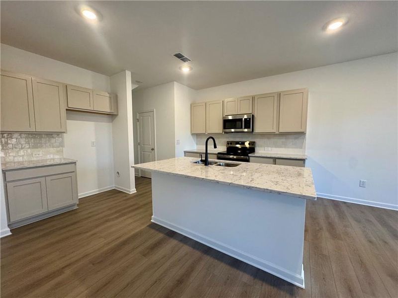 Furnished interior view inside a new home in Eastlyn Crossing, Flowery Branch (Image 9).