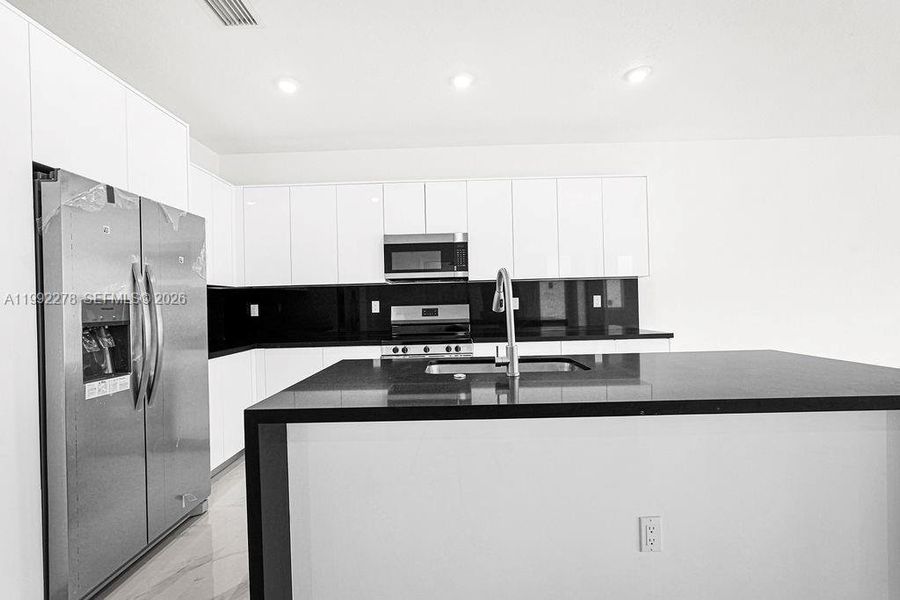 Furnished interior view inside a new home in , Miami (Image 16).