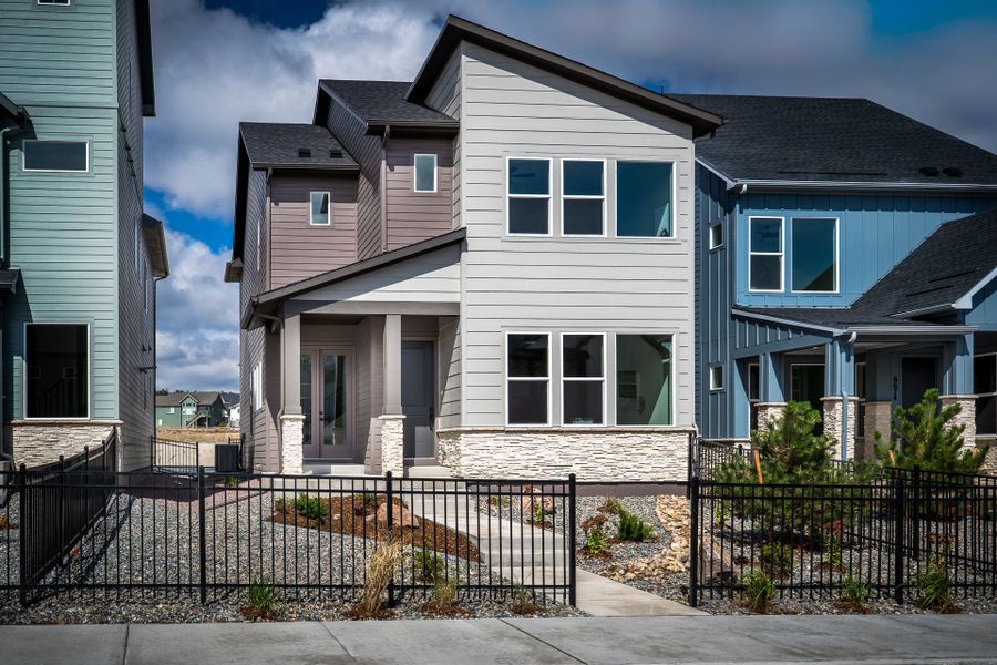 Front exterior of a new home in Elevate at Wolf Ranch, Colorado Springs, CO, highlighting curb appeal (Image 2). Front exterior of a new home in Elevate at Wolf Ranch, Colorado Springs, CO, highlighting curb appeal (Image 2).