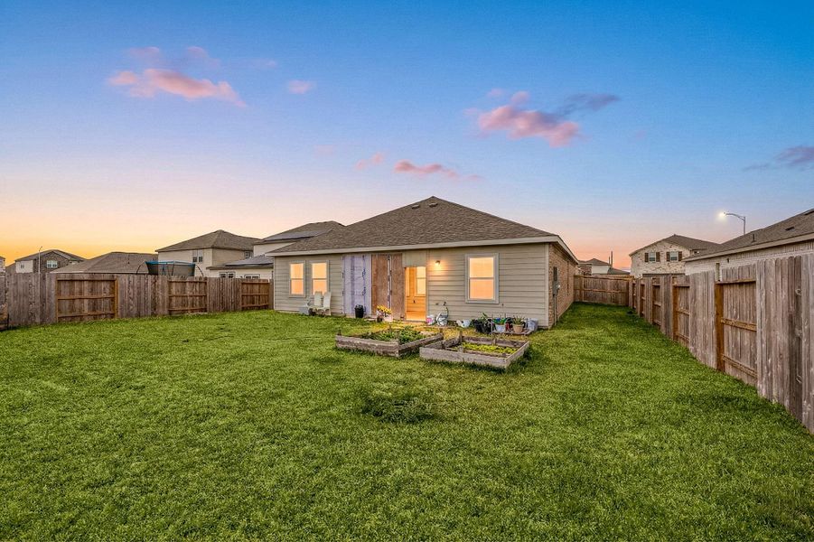 Expansive, fully fenced backyard providing plenty of room for outdoor activities