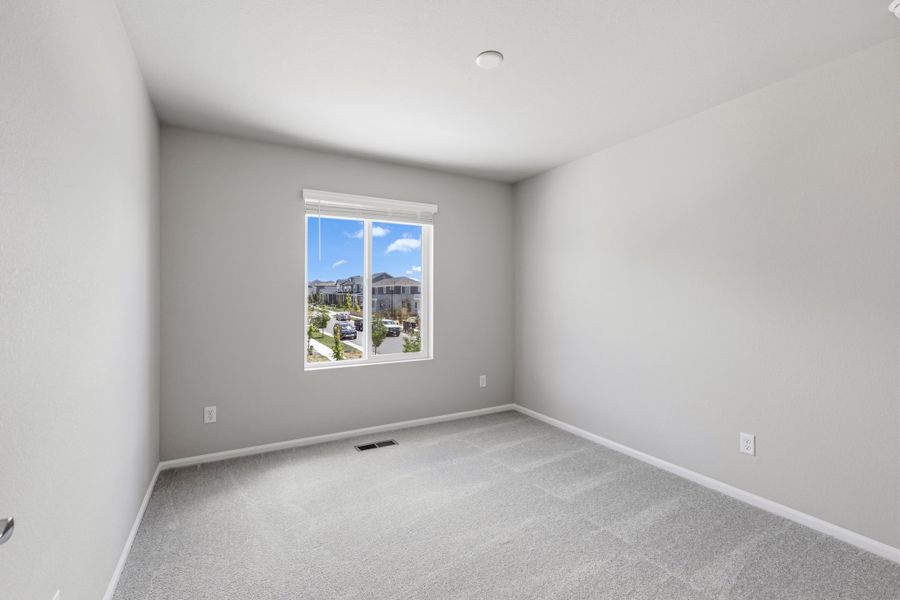 Spacious, unfurnished interior of a new home in Woodrose at Painted Prairie, Aurora (Image 16).