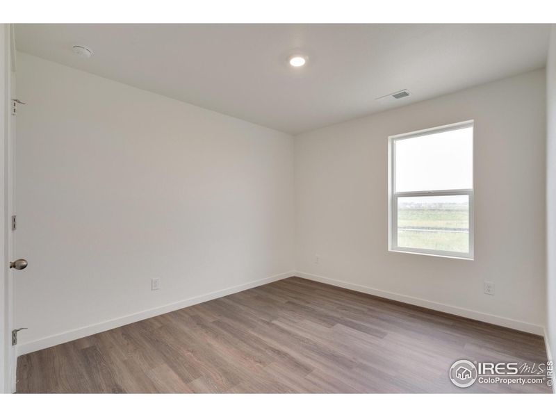 Spacious, unfurnished interior of a new home in Silver Peaks, Lochbuie (Image 16).