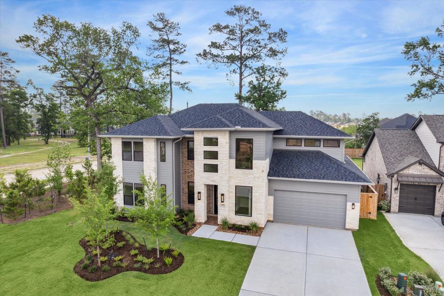 NEW CONSTRUCTION by award-winning Jamestown Estate Homes. 5 BR/4.1 BA, 3-Car Tandem Garage, modern-influenced home located in the sought-after Grand Central Park community in Conroe NEW CONSTRUCTION by award-winning Jamestown Estate Homes. 5 BR/4.1 BA, 3-Car Tandem Garage, modern-influenced home located in the sought-after Grand Central Park community in Conroe