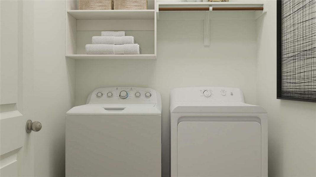 Laundry room featuring washer and dryer