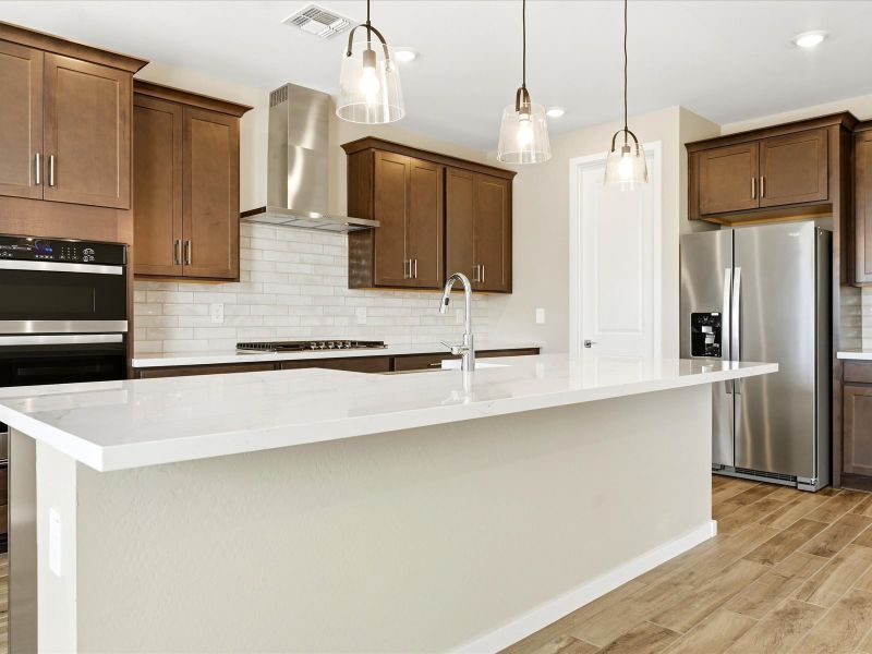 Furnished interior view inside a new home in White Tank Foothills Signature Series, Waddell (Image 3).