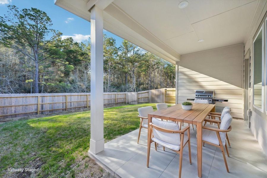 Exterior details and patio area of a home in Landing Meadows - Traditional Series, New Caney (Image 23).