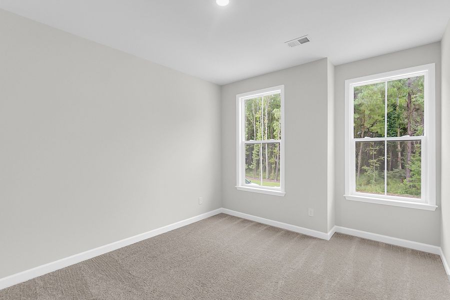 Spacious, unfurnished interior of a new home in Pineland Preserve, Summerville (Image 33).