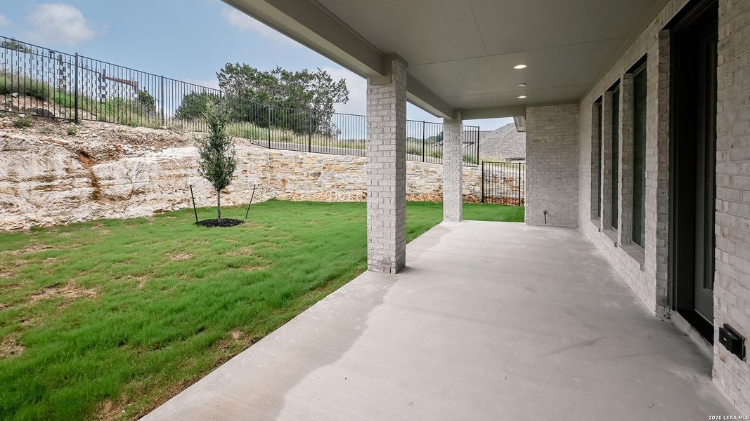 Exterior details and patio area of a home in Hidden Canyon, San Antonio (Image 18).