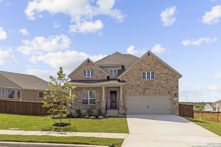 Front exterior of a new home in Homestead, Schertz, TX, highlighting curb appeal (Image 1).