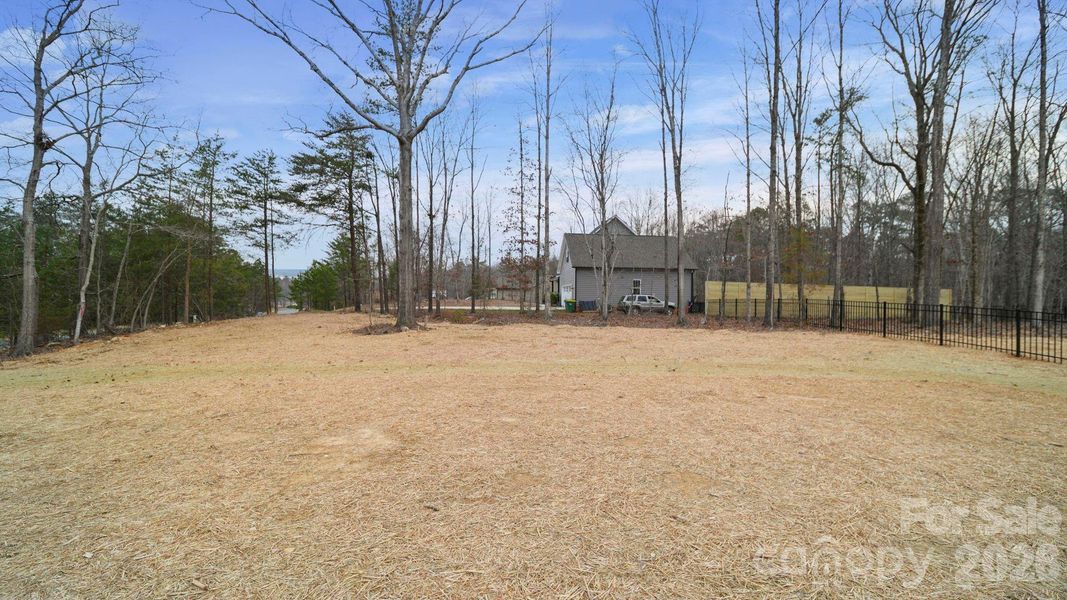 Exterior details and patio area of a home in , Oakboro (Image 17).