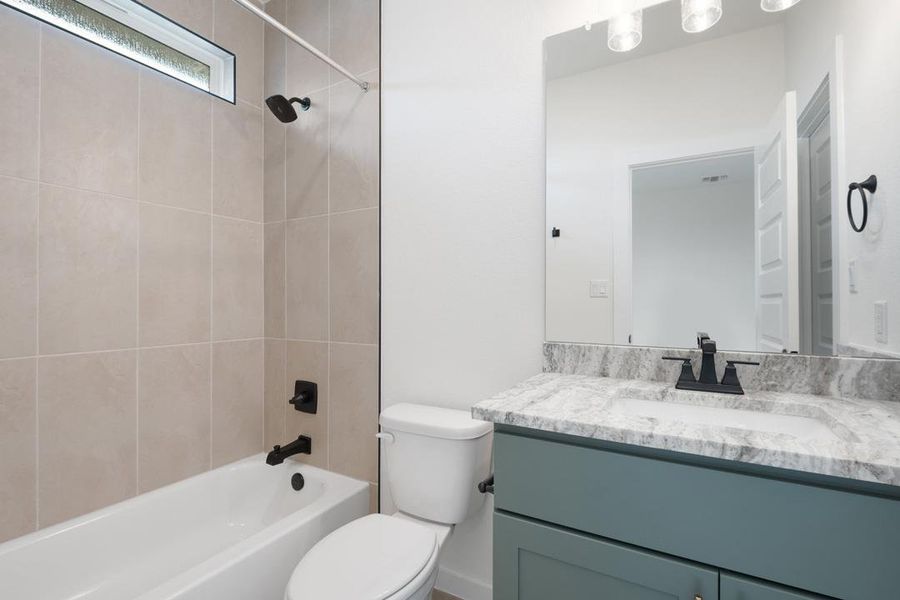 Furnished interior view inside a new home in Heritage, Dripping Springs (Image 13).