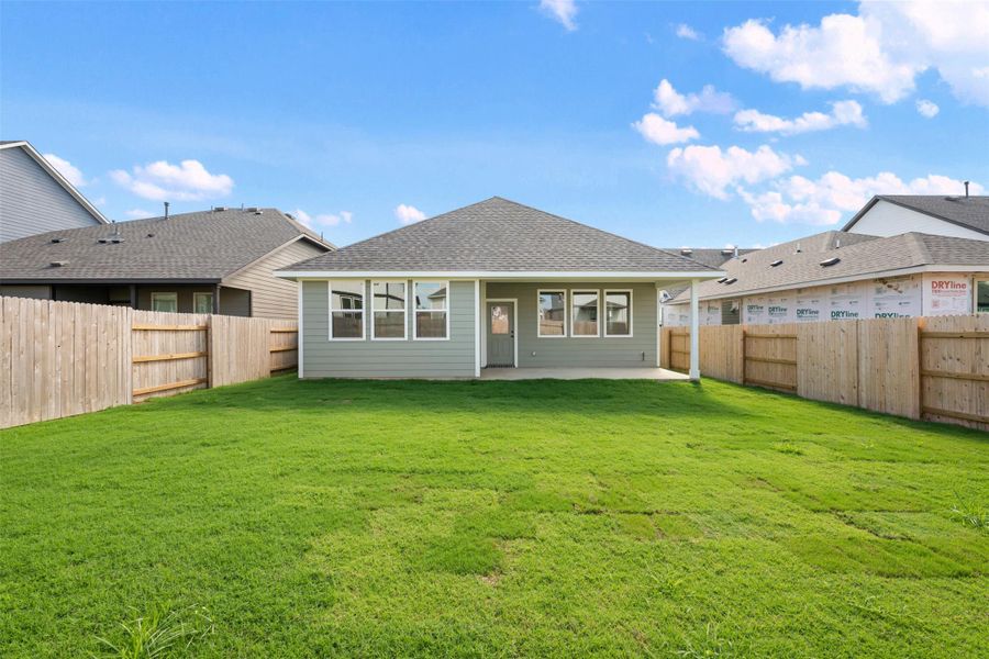 Exterior details and patio area of a home in Patterson Ranch, Georgetown (Image 27).