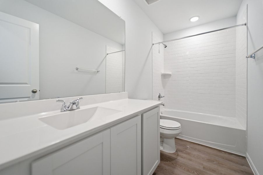 Furnished interior view inside a new home in The Pines at Seven Coves, Willis (Image 5).