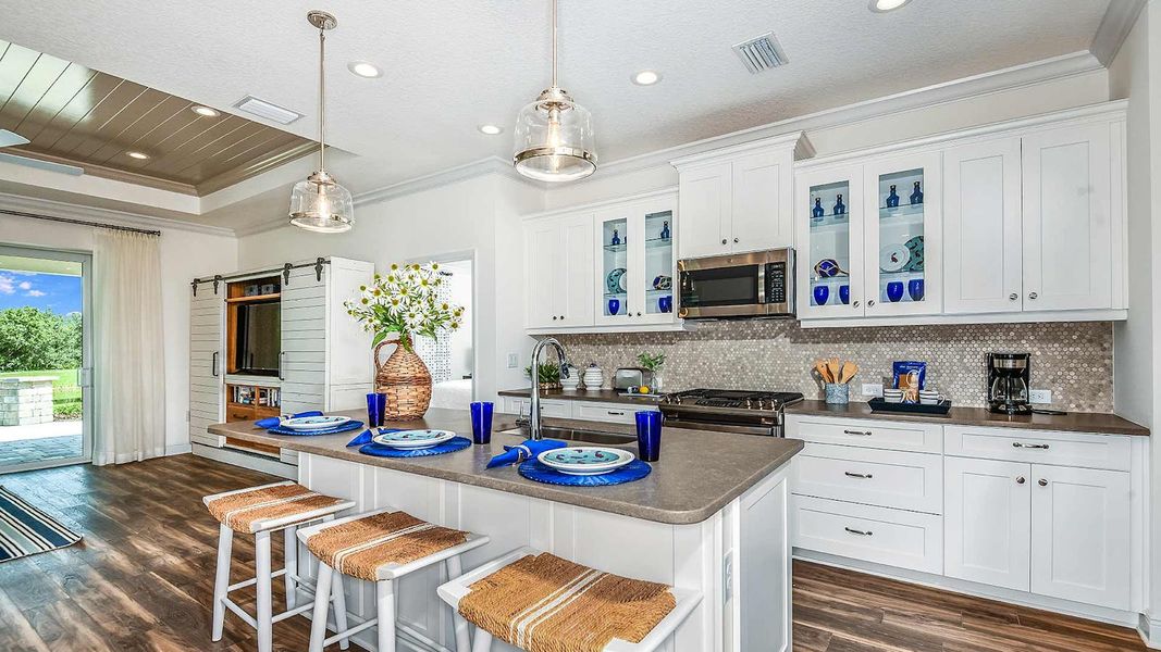 Furnished interior view inside a new home in SkySail Real Estate and Homes for Sale in Naples, FL - Neal Communities, Naples (Image 7).