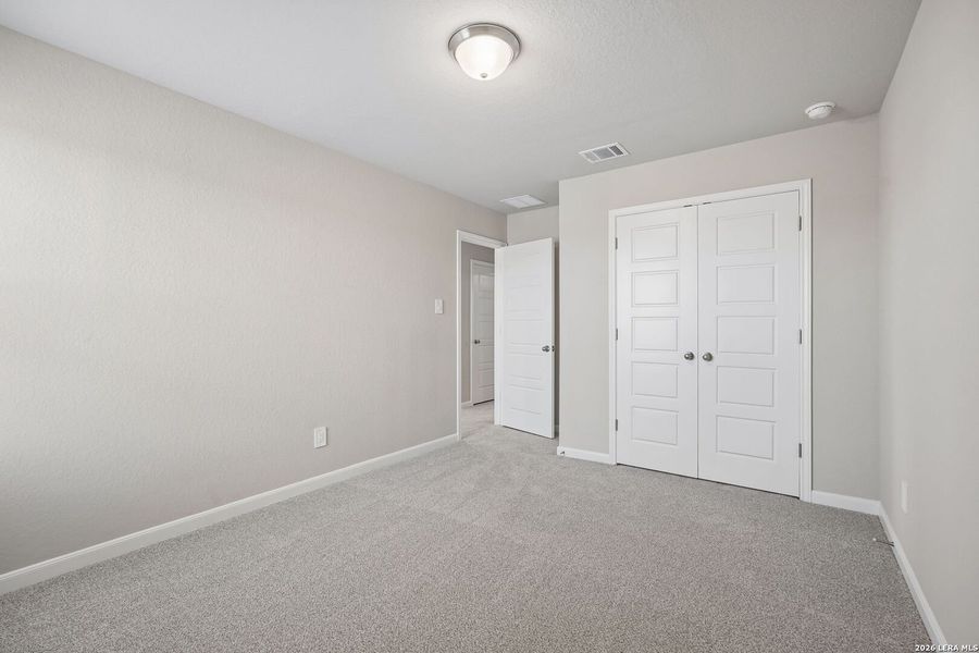 Spacious, unfurnished interior of a new home in Remington Ranch, San Antonio (Image 28).