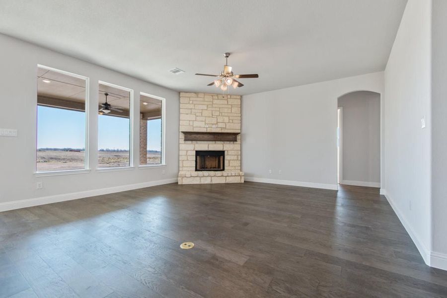 Family Room | Concept 2406 at The Meadows in Gunter, TX by Landsea Homes