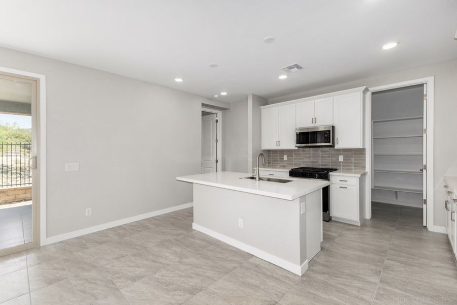 Furnished interior view inside a new home in Mira Vista at Victory, Buckeye (Image 5).