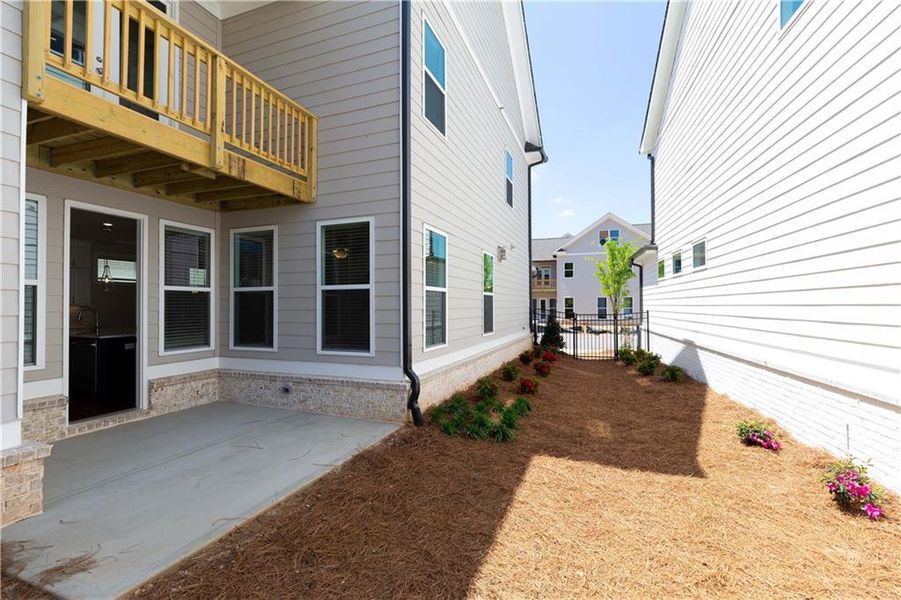 Exterior details and patio area of a home in Waterside Single Family, Peachtree Corners (Image 29).