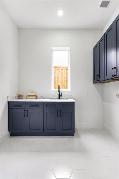 Laundry room with sink