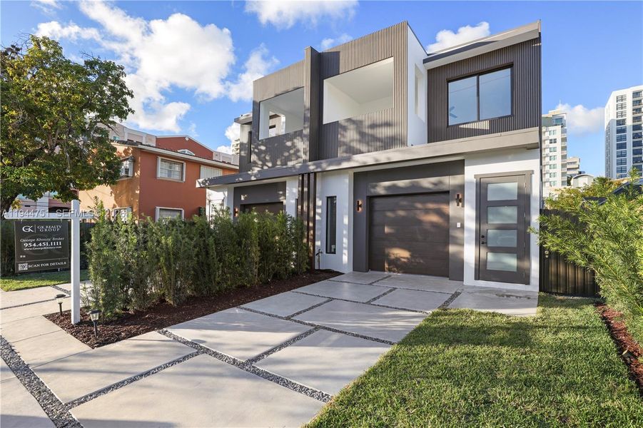 Front exterior of a new home in , Miami, FL, highlighting curb appeal (Image 20).