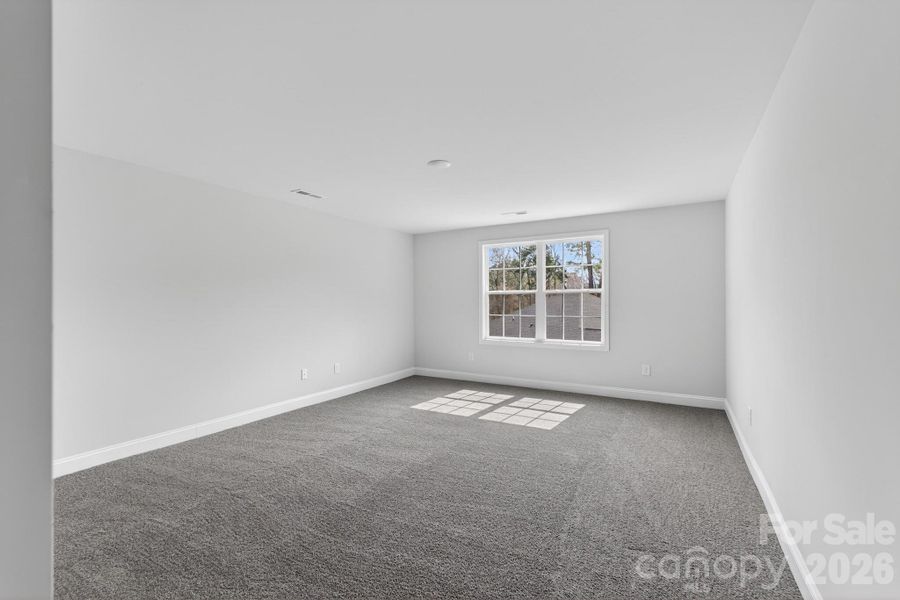 Spacious, unfurnished interior of a new home in Crystal Village, Albemarle (Image 12).