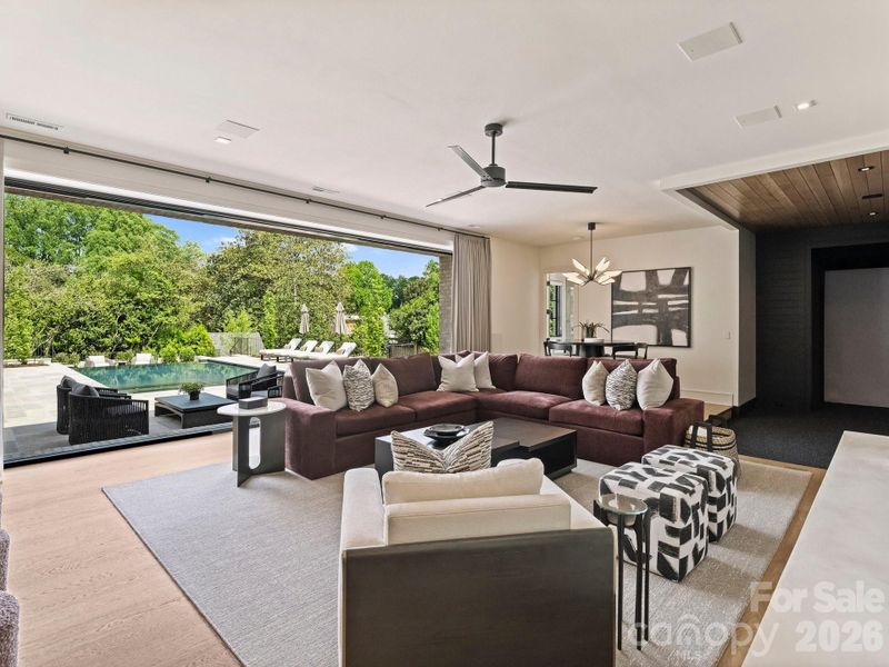 Entertainment space with full sliding door perfect for hosting guests and allowing indoor/outdoor living