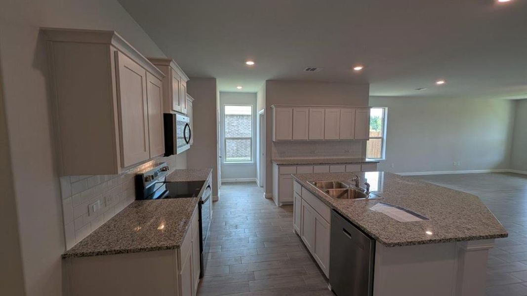 Kitchen - All Home and community information, including pricing, included features, terms, availability and amenities, are subject to change at any time without notice or obligation. All Drawings, pictures, photographs, video, square footages, floor plans, elevations, features, colors and sizes are approximate for illustration purposes only and will vary from the homes as built.