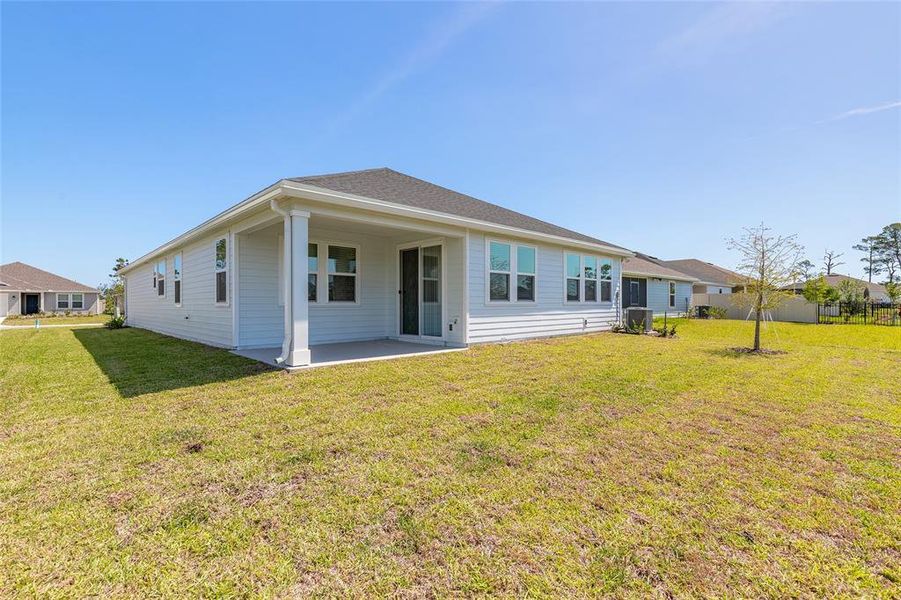 Exterior details and patio area of a home in , Flagler Beach (Image 3).