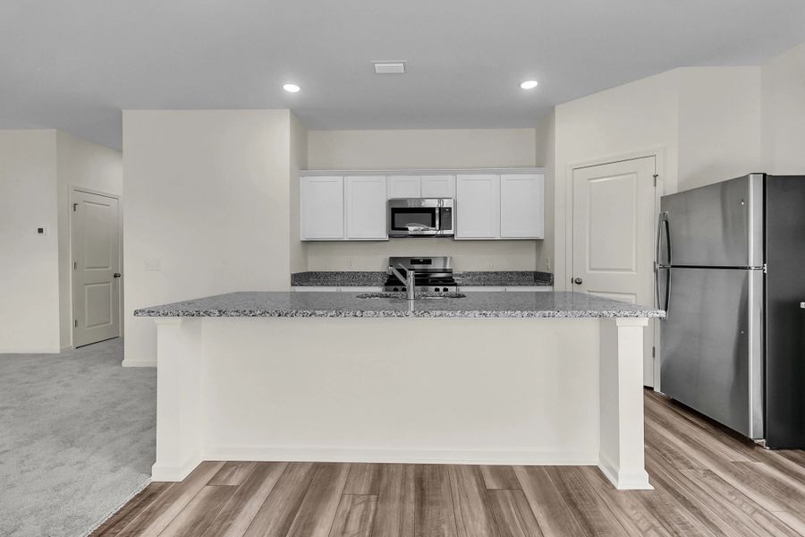 Representative furnished interior of a home built from the Supernova by Starlight Homes in Liberte, Converse (Image 9).