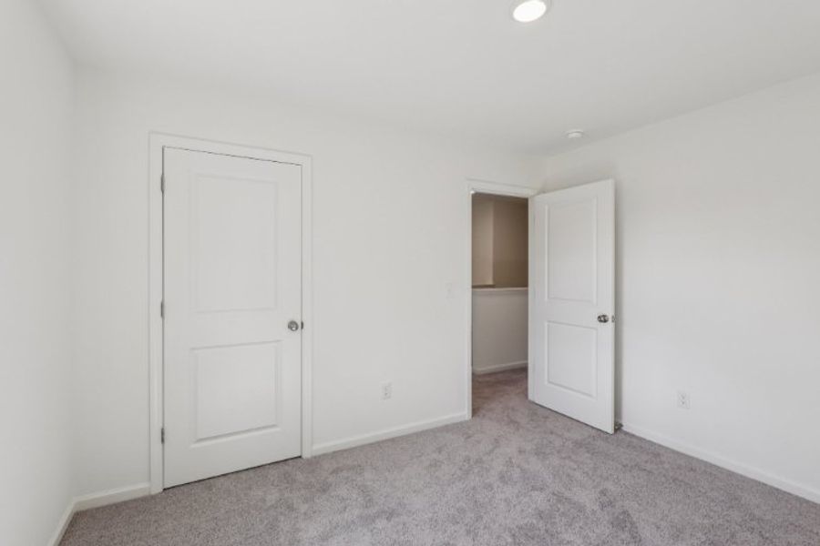 A room with white doors. A room with white doors.