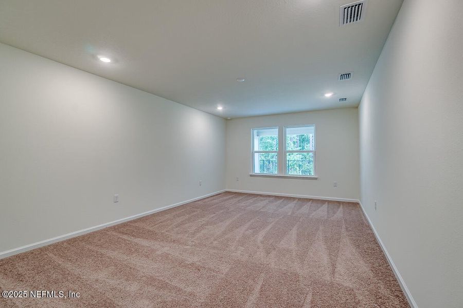 Spacious, unfurnished interior of a new home in Anabelle Island - Classic Series, Green Cove Springs (Image 16).