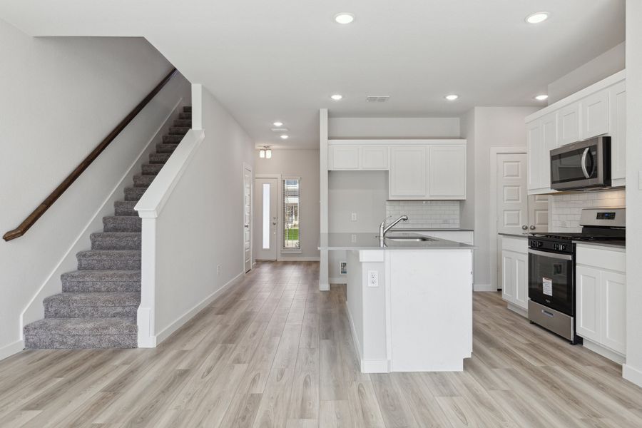 Kitchen in the Mesquite home plan by Trophy Signature Homes – REPRESENTATIVE PHOTO