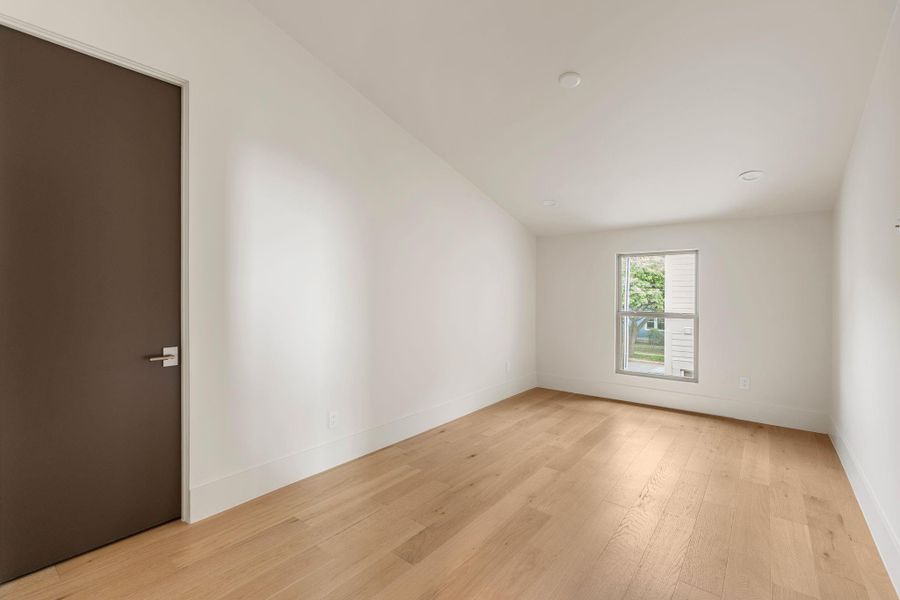 Bedroom 4 features elevated ceilings that follow the roofline, creating additional volume to the space. Bedroom 4 features elevated ceilings that follow the roofline, creating additional volume to the space.