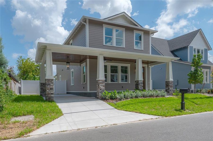 Front exterior of a new home in , Tampa, FL, highlighting curb appeal (Image 2). Front exterior of a new home in , Tampa, FL, highlighting curb appeal (Image 2).