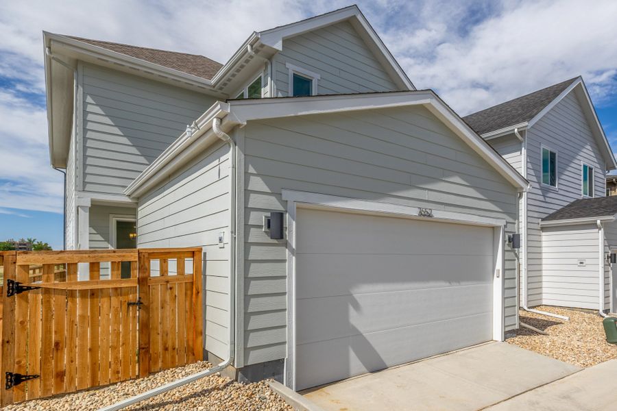 Front exterior of a new home in Arras Park, Thornton, CO, highlighting curb appeal (Image 25).