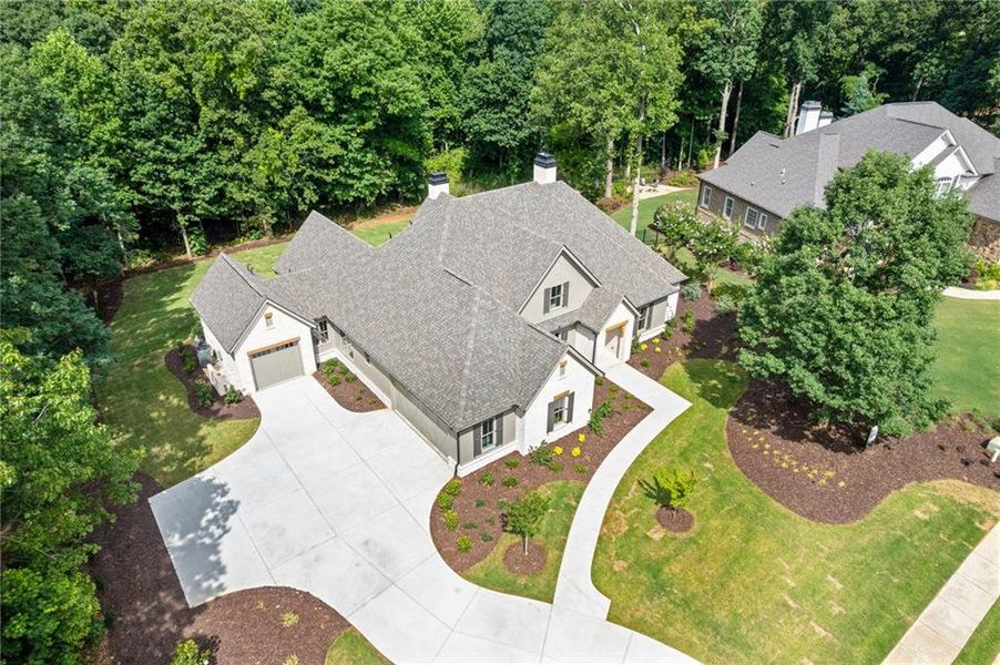 Front exterior of a new home in , Flowery Branch, GA, highlighting curb appeal (Image 35).