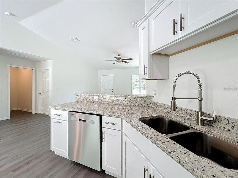 Furnished interior view inside a new home in , Dunnellon (Image 6).