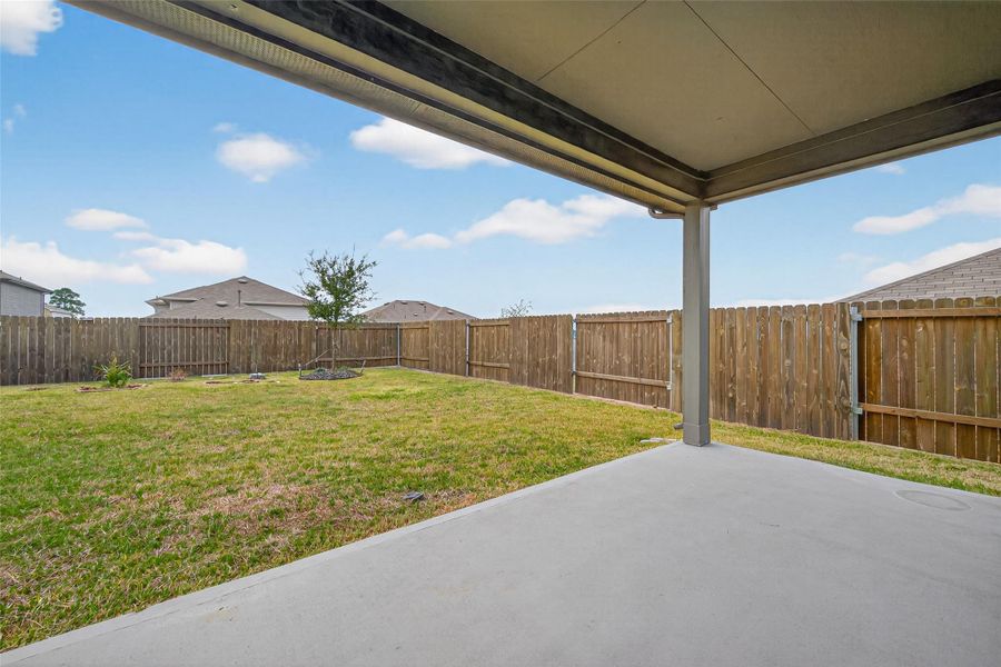 Exterior details and patio area of a home in Water Crest on Lake Conroe, Conroe (Image 3).