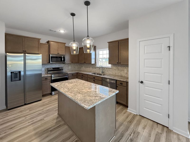 Furnished interior view inside a new home in The Village at Sassafras, Allenhurst (Image 4).