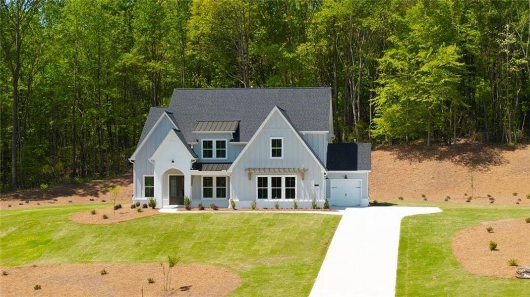 Front exterior of a new home in , Gainesville, GA, highlighting curb appeal (Image 27).