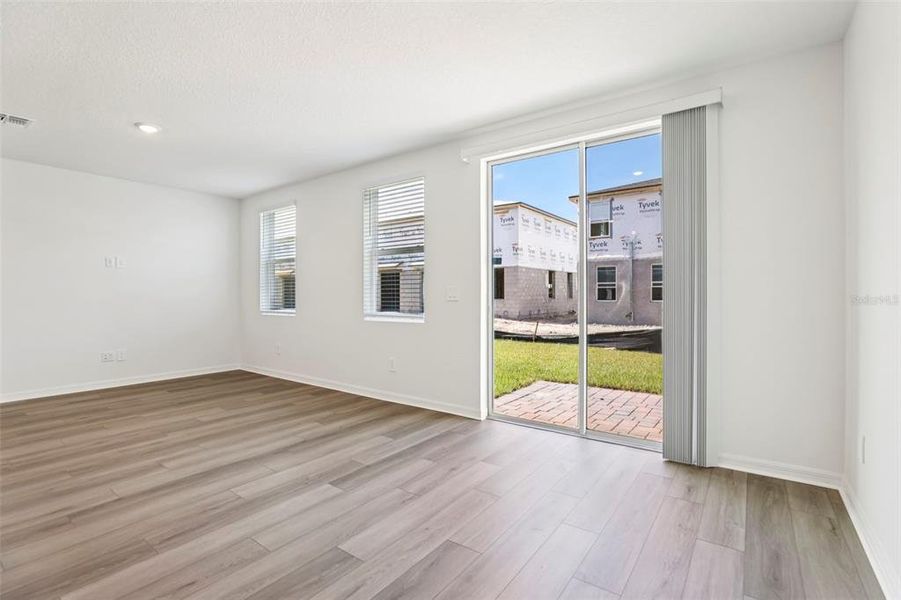 Spacious, unfurnished interior of a new home in The Meadow at Crossprairie Townes, St. Cloud (Image 33).