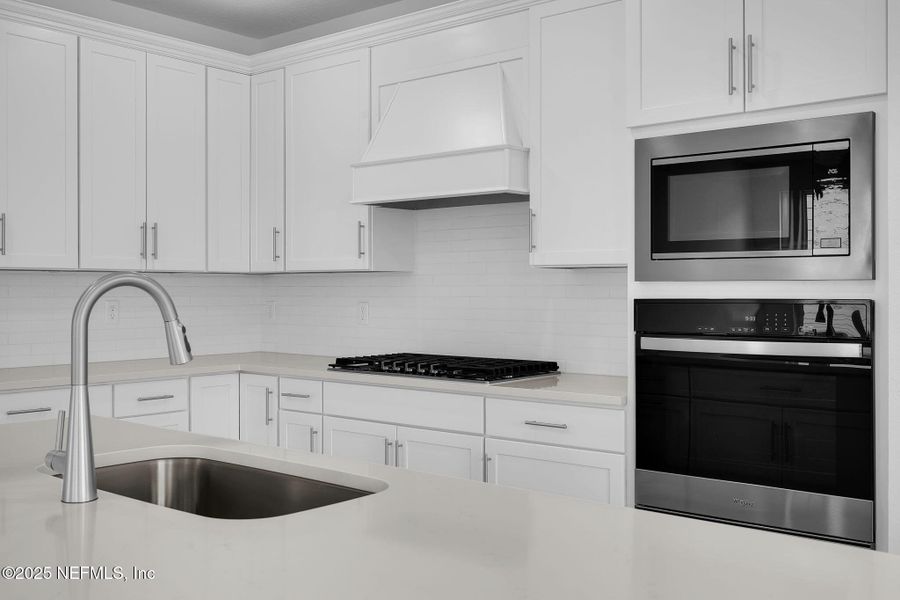 Furnished interior view inside a new home in Summer Bay at Grand Oaks, St. Augustine (Image 7).