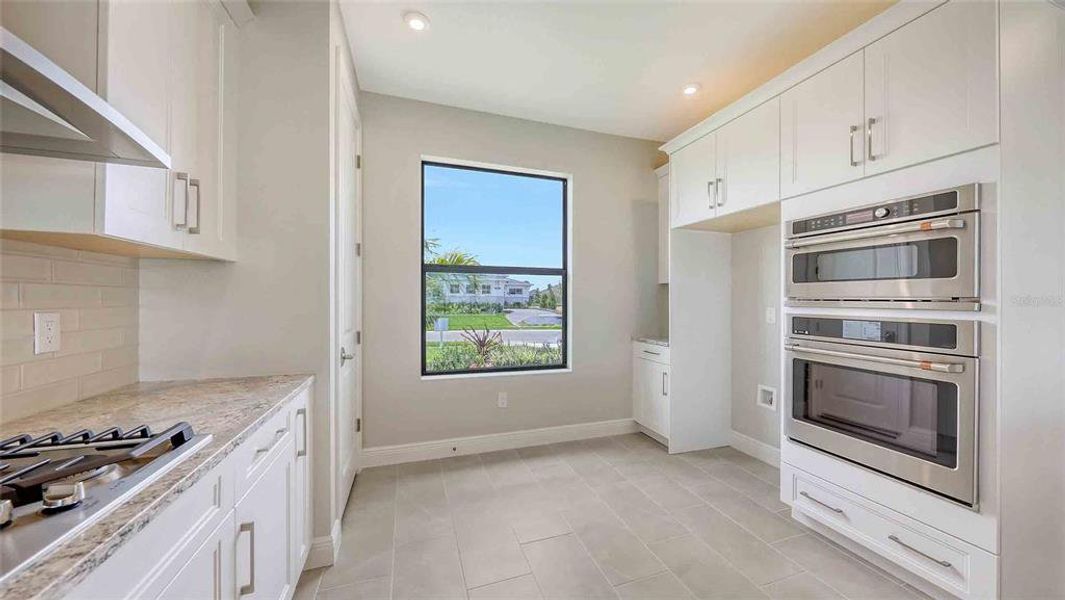 Furnished interior view inside a new home in Woodland Preserve, Parrish (Image 6).