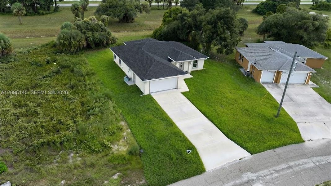 Front exterior of a new home in , Labelle, FL, highlighting curb appeal (Image 22). Front exterior of a new home in , Labelle, FL, highlighting curb appeal (Image 22).